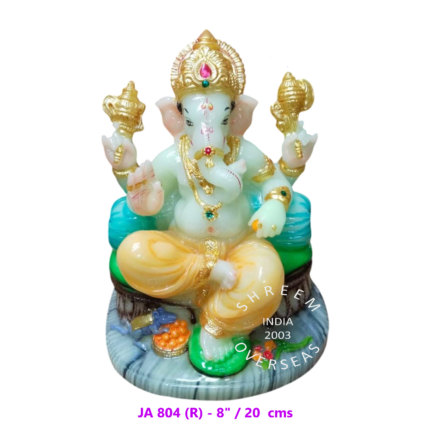 8-inch radium Ganesha idol with golden crown and orange dhoti that glows in the dark for wholesale export to Australia and Fiji.