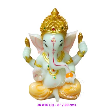 8-inch radium Ganesha idol with golden crown and orange dhoti that glows in the dark for wholesale export to USA and United Kingdom.